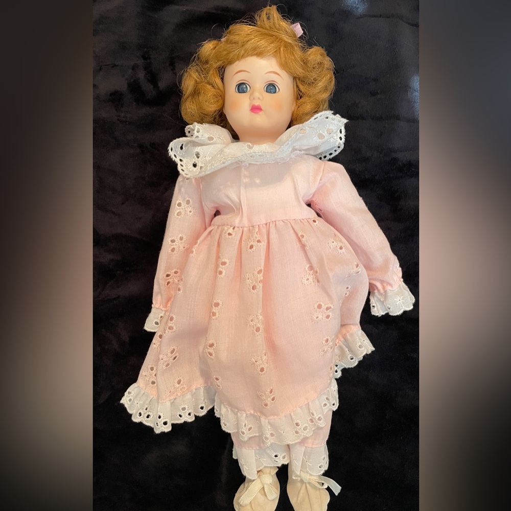 Bradley 12” Porcelain doll. Pink dress. Reddish blond hair. Collector. Vintage